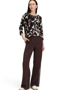 Blouse fluide dense et structurée