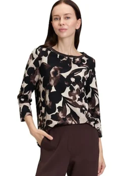 Blouse fluide dense et structurée