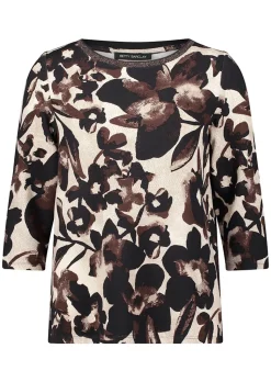 Blouse fluide dense et structurée