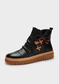 Bottines en cuir avec nœud décoratif
