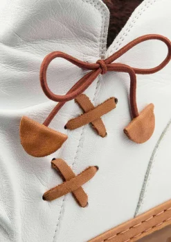 Bottines en cuir avec nœud décoratif