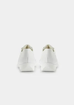 Chaussures basses avec perforations décoratives