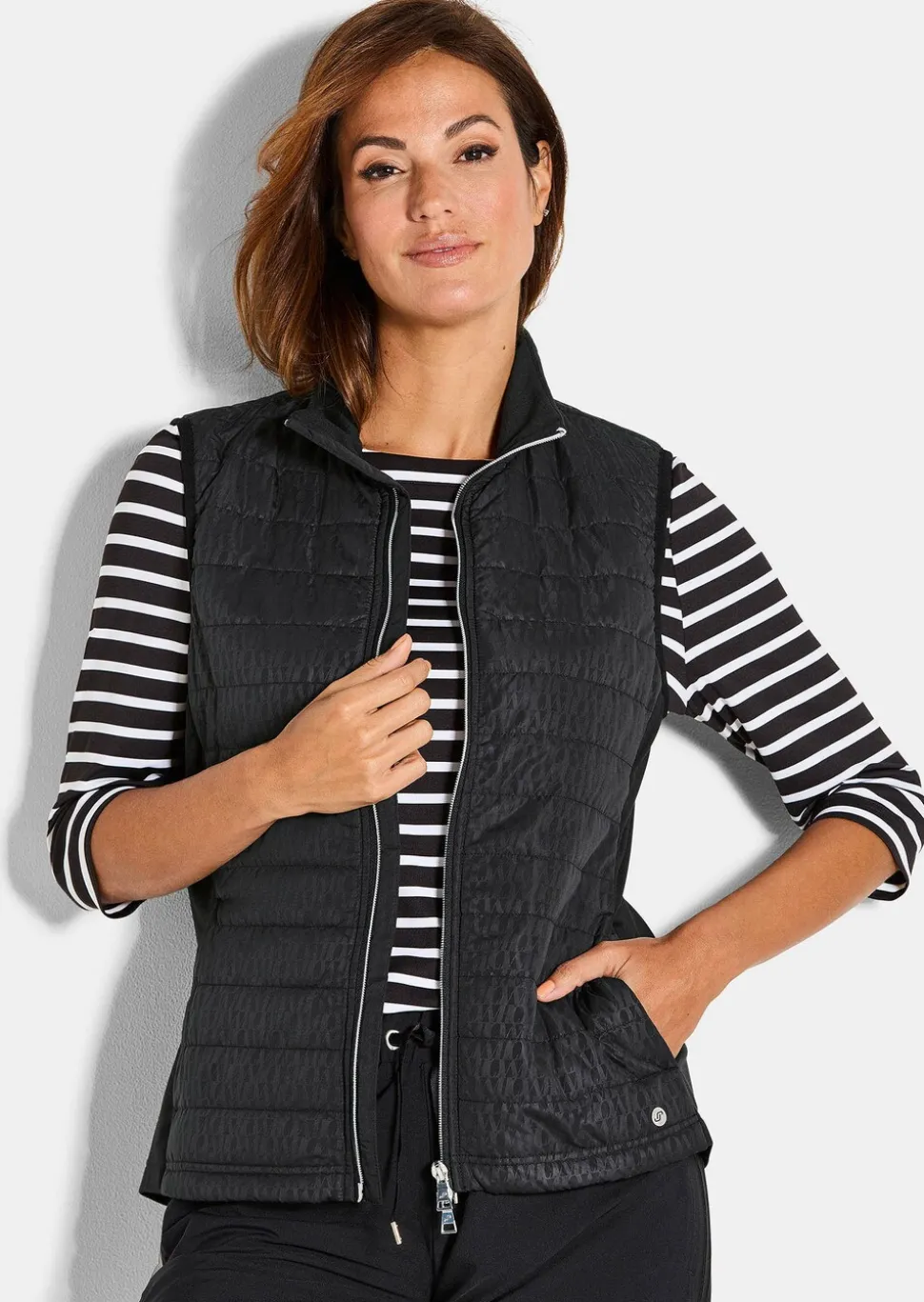 Gilet matelassé avec empiècements en jersey