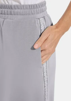 Jupe en sweat avec lien de serrage sous coulisse. En coton et élasthanne.