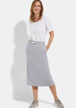 Jupe en sweat avec lien de serrage sous coulisse. En coton et élasthanne.