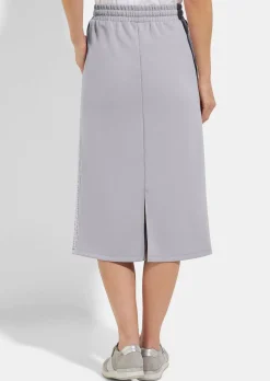 Jupe en sweat avec lien de serrage sous coulisse. En coton et élasthanne.