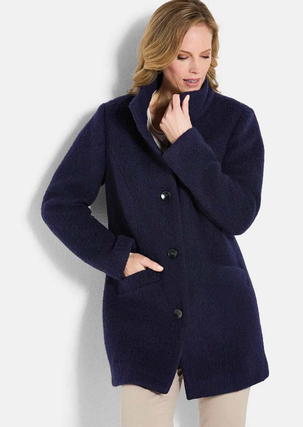 Manteau laineux avec col montant