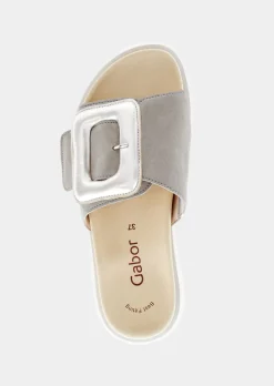 Mules avec boucle décorative