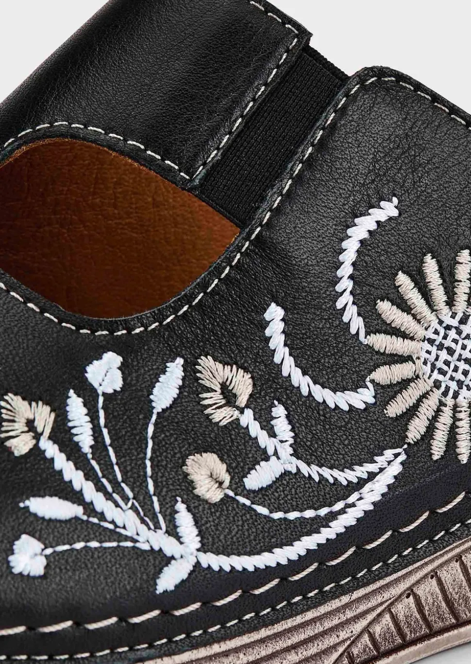 Mules en cuir avec motif floral