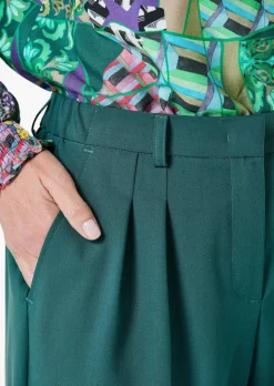 Pantalon élégant avec plis à la taille