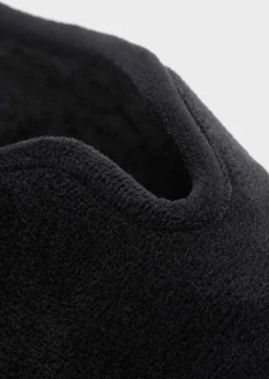 Pantoufles avec semelle extérieure à surface structurée pour une meilleure accroche.