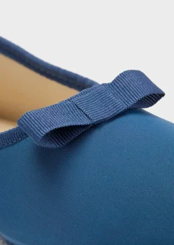 Pantoufles ballerines avec semelle extérieure à surface structurée pour une meilleure accroche.