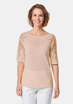Pull avec empiècements en dentelle et pierres scintillantes