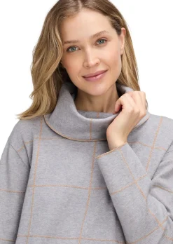 Pull à col roulé avec motif à carreaux