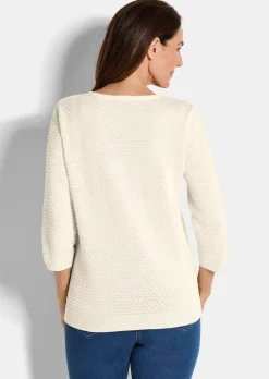 Pull en tricot avec motif à pois