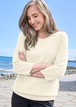 Pull en tricot avec motif à pois