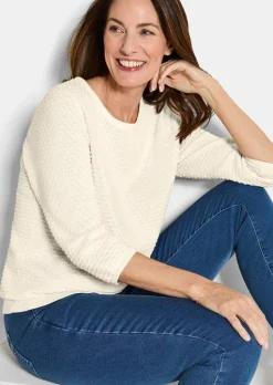 Pull en tricot avec motif à pois