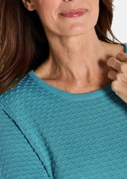 Pull en tricot avec motif à pois