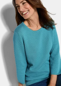 Pull en tricot avec motif à pois