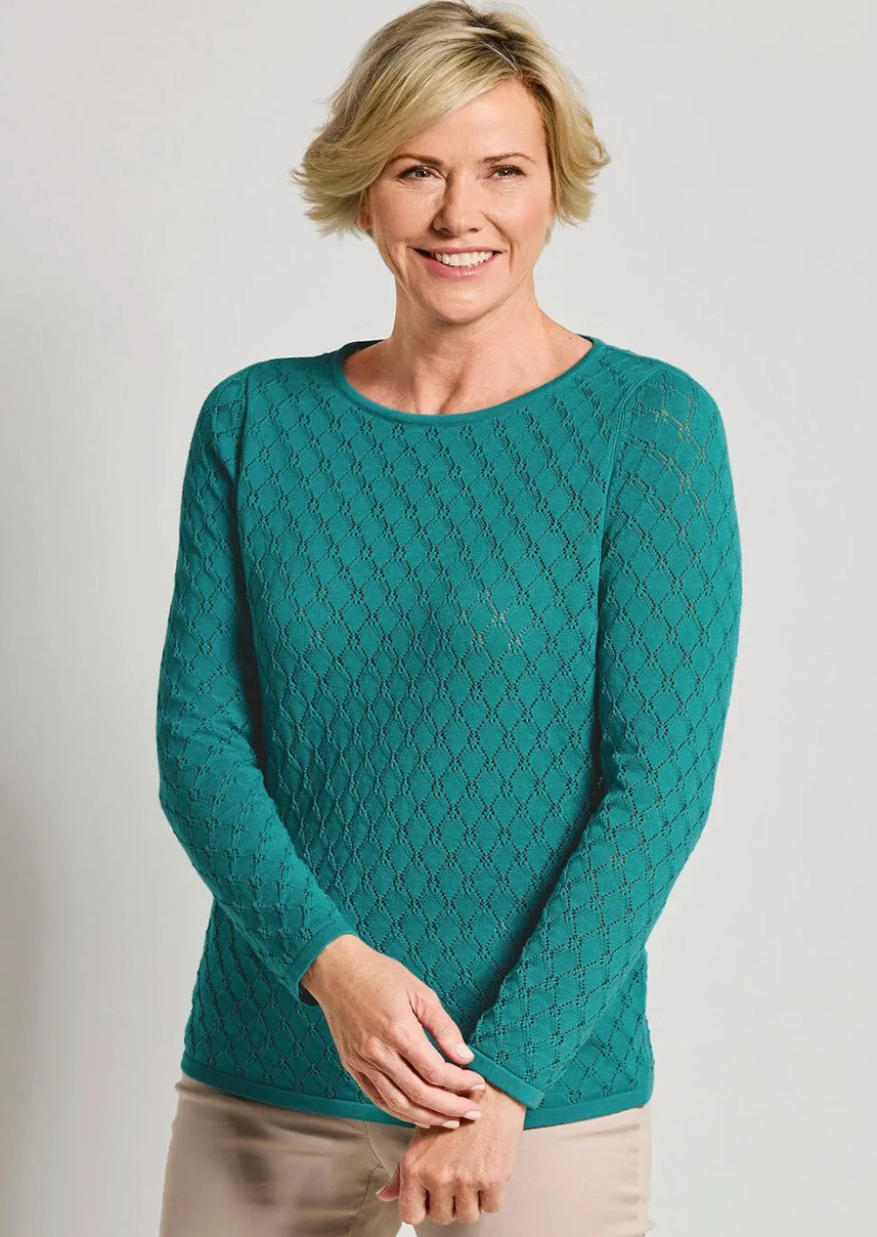 Pull en tricot à la structure alvéolée