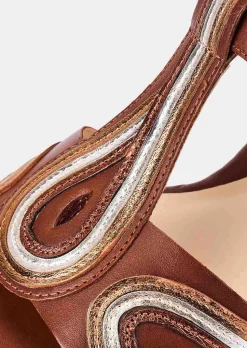 Sandales en cuir avec talon compensé
