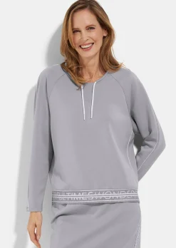 Sweat-shirt avec lien de serrage et passepoils