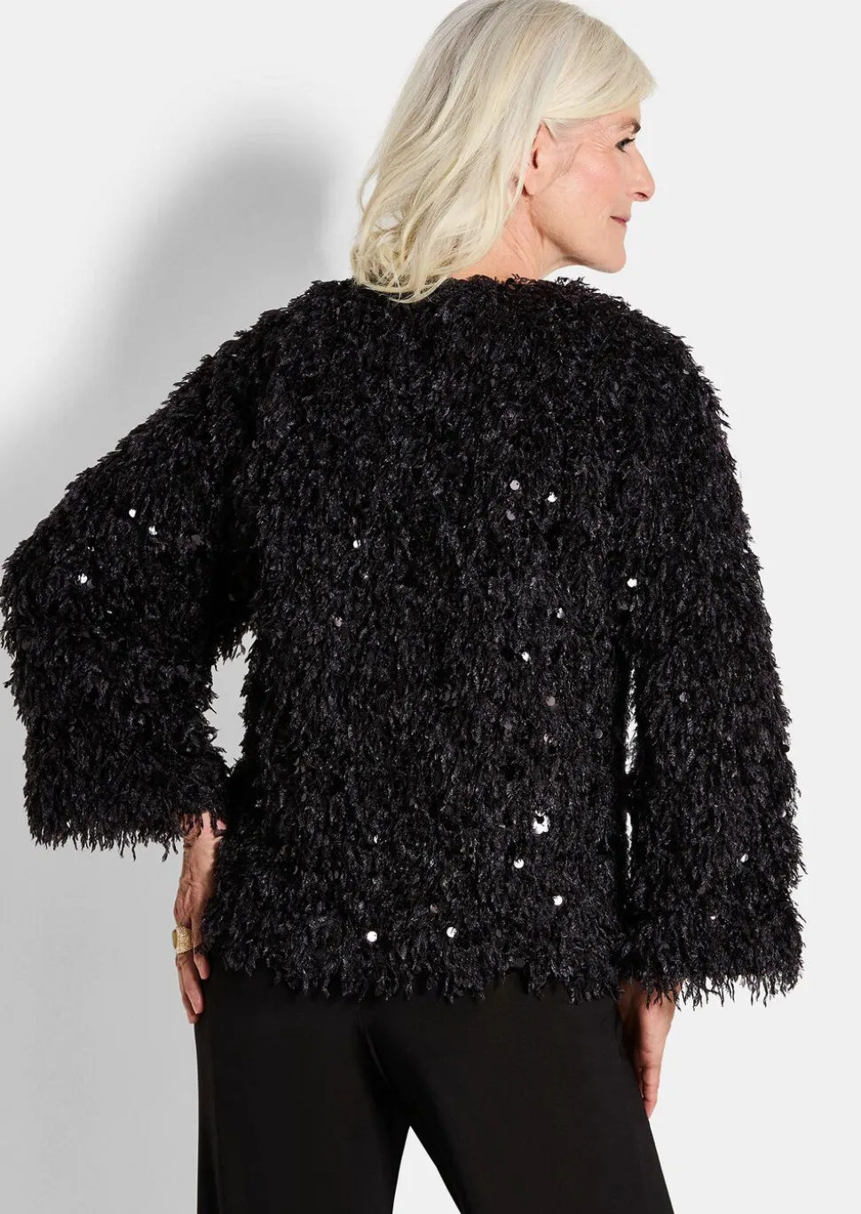 Veste aspect plumes, orné de paillettes