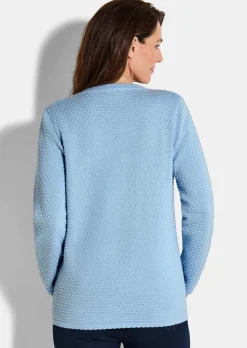 Veste en tricot avec motif à pois