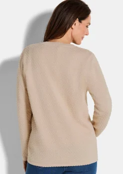 Veste en tricot avec motif à pois