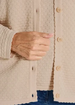Veste en tricot avec motif à pois