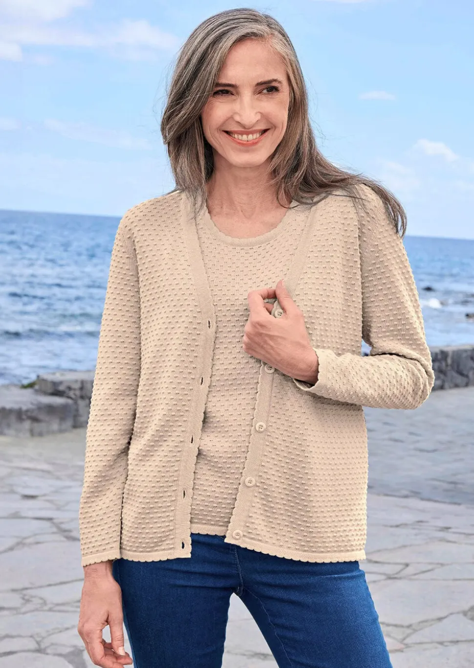 Veste en tricot avec motif à pois