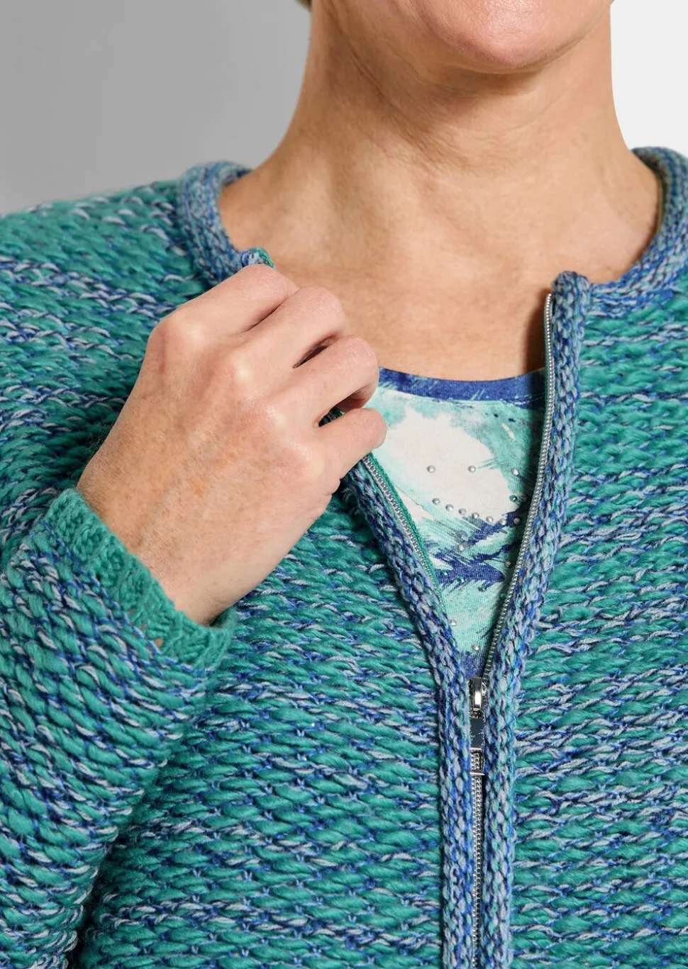 Veste en tricot avec zip sous patte