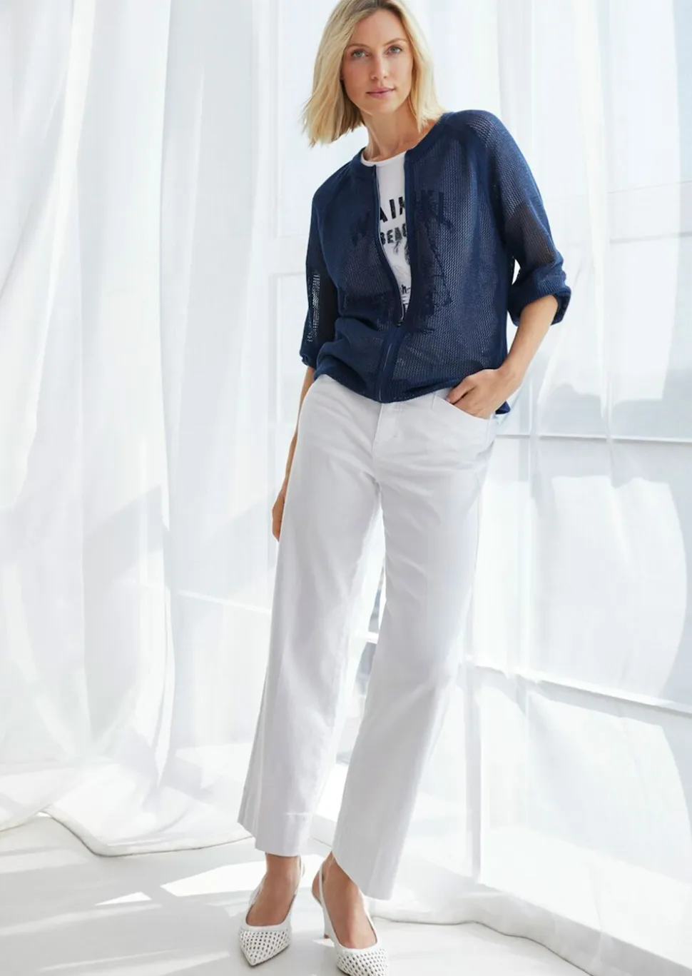 Veste en tricot transparente avec fil brillant