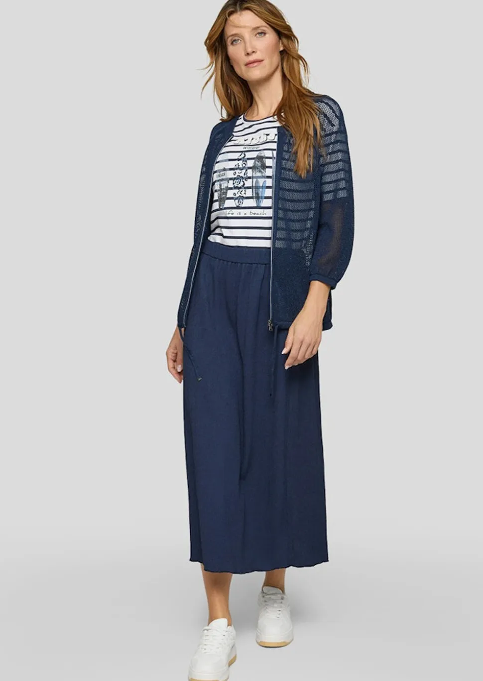 Veste en tricot transparente avec fil brillant