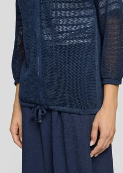 Veste en tricot transparente avec fil brillant