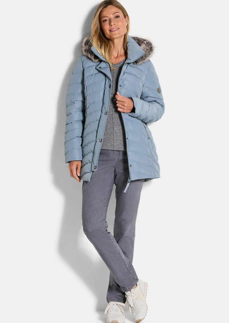 Veste matelassée avec capuche en fausse fourrure