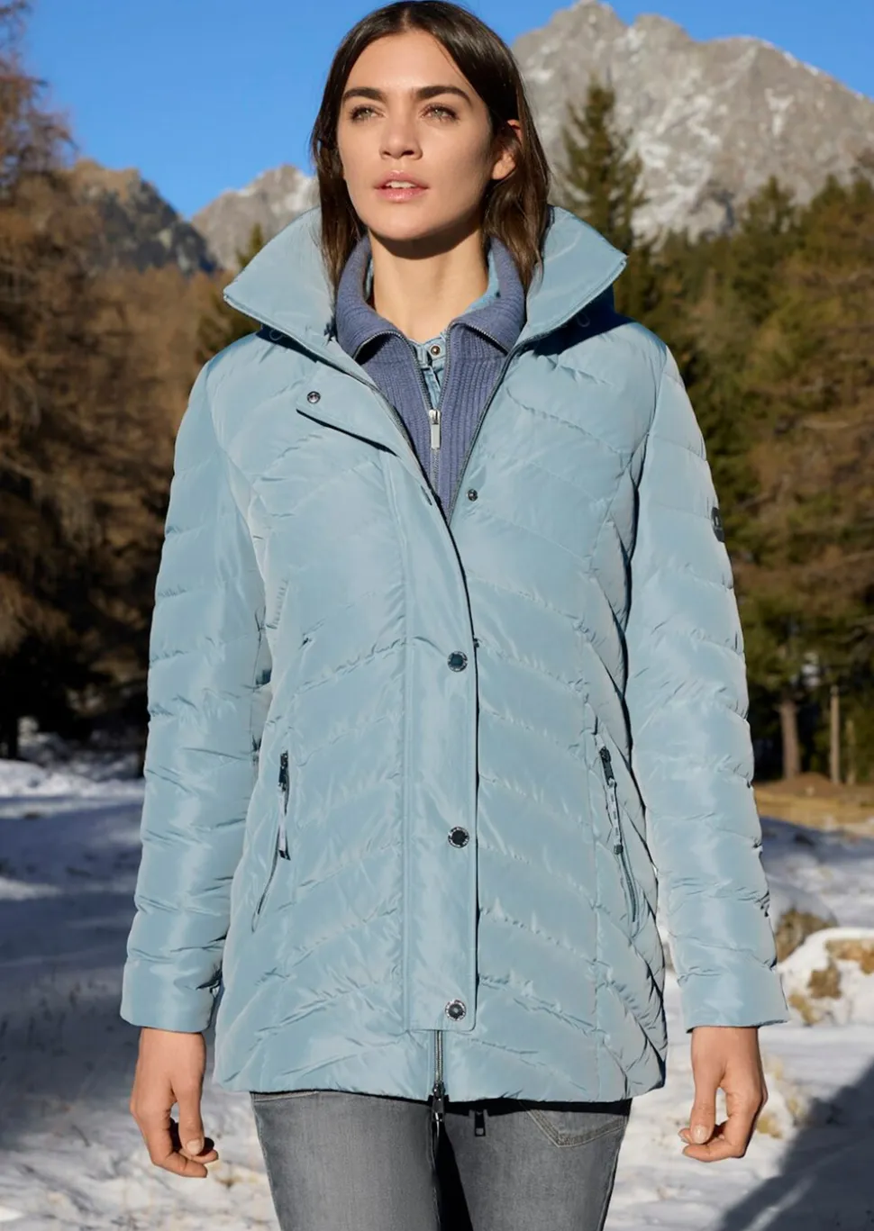Veste matelassée avec capuche en fausse fourrure